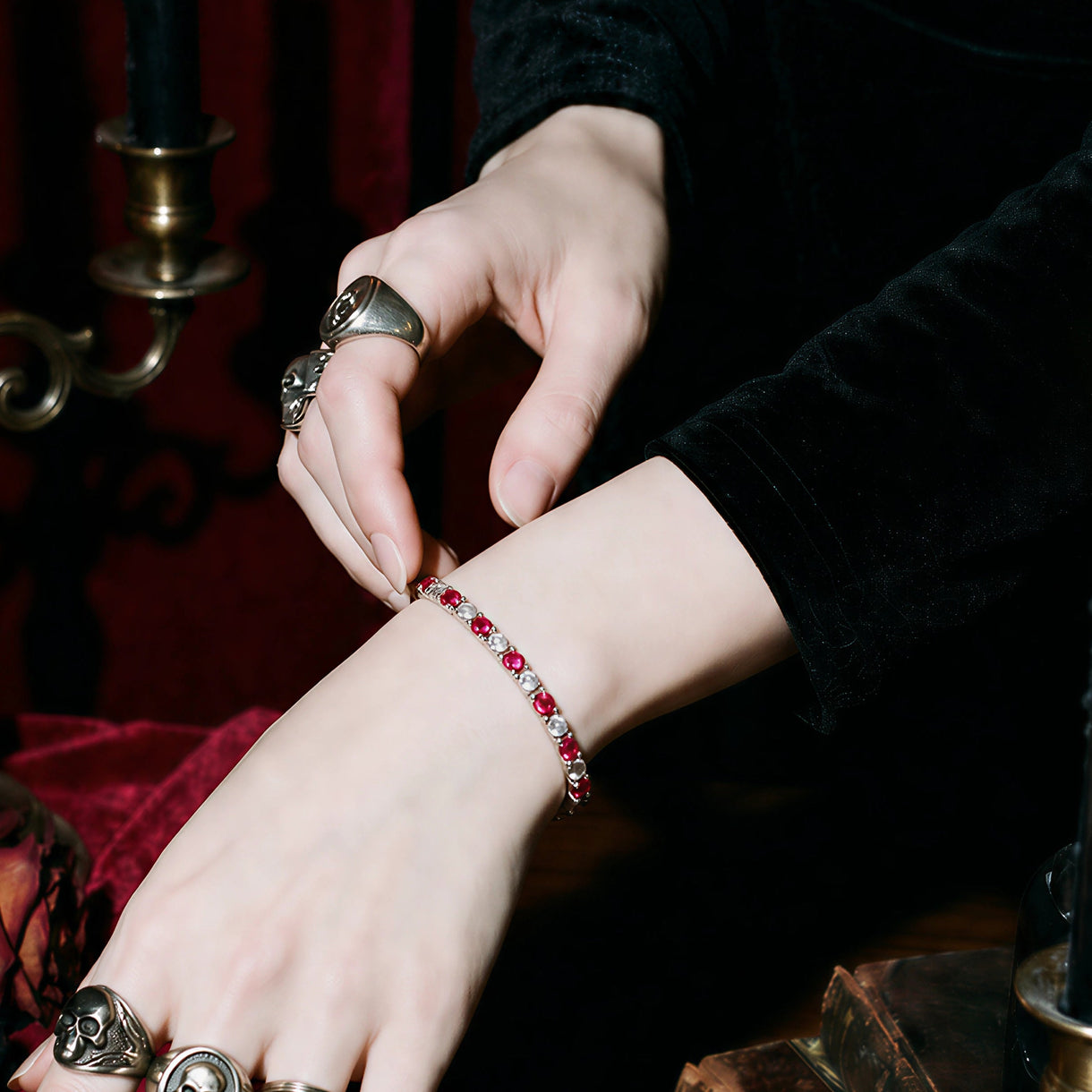 Jewelhalo sterling silver ruby tennis bracelet worn on wrist