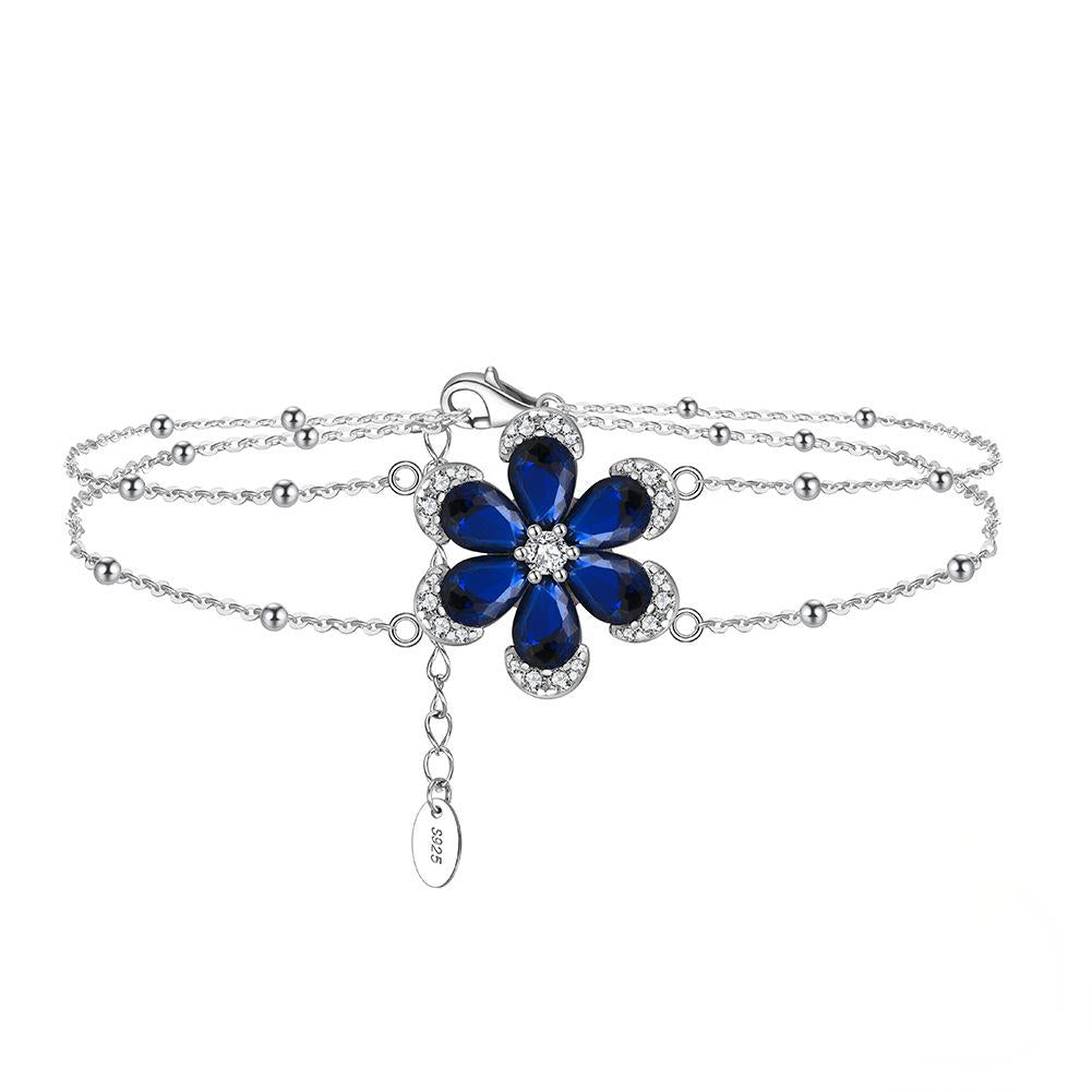Sterling silver sapphire flower bracelet by Jewelhalo